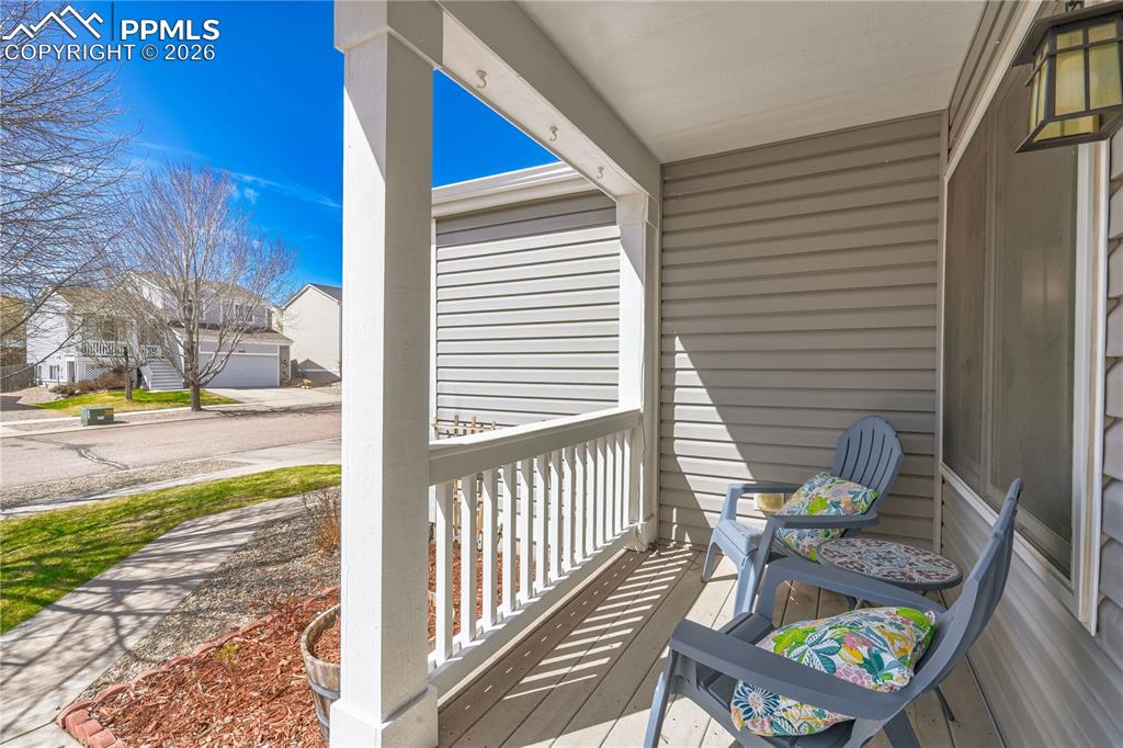 Image 4 of 27: Porch featuring a residential view