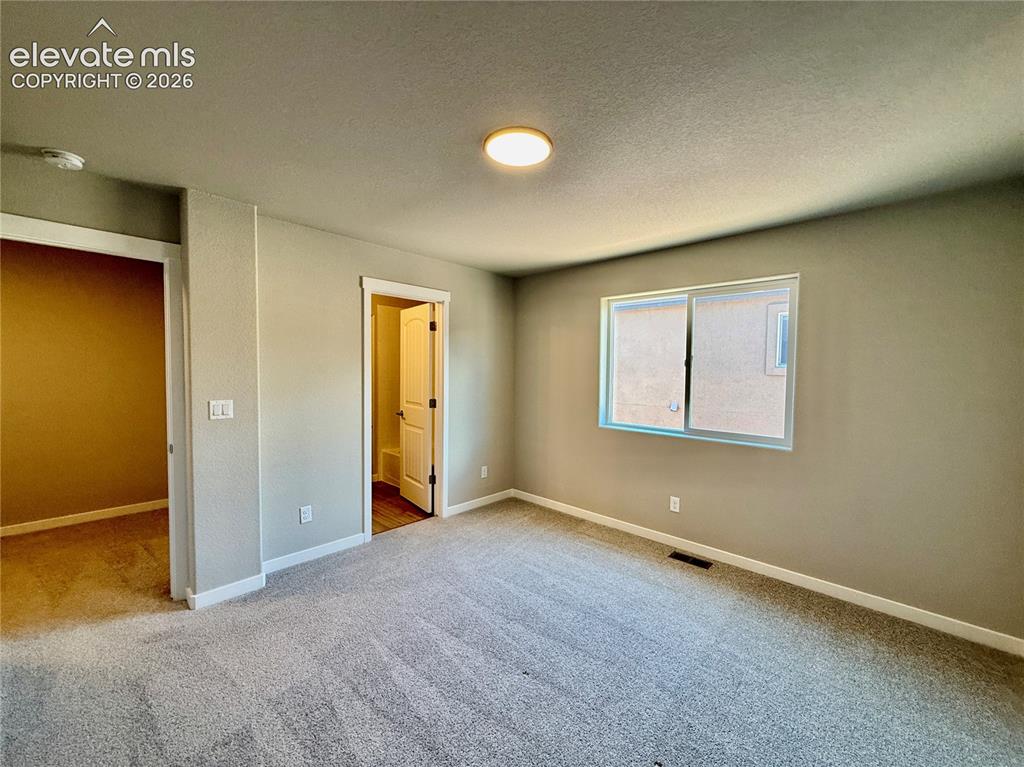 Image 9 of 19: Bedroom