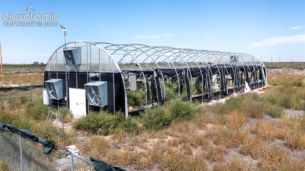 Image 27 of 41: Arched Greenhouse