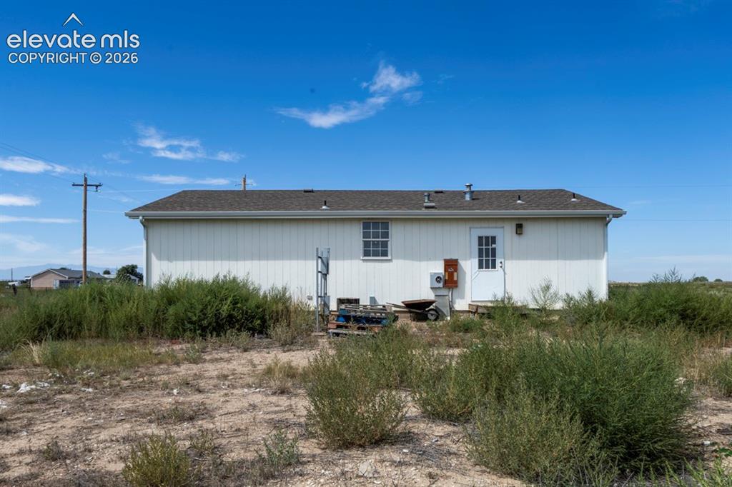Image 3 of 41: Back of Manufactured Home