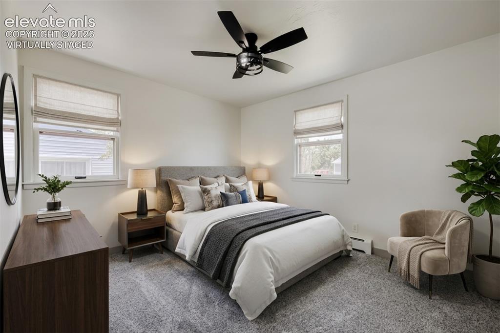Image 14 of 41: Recessed lighting, ceiling fan with matte black finish, light gray upholste