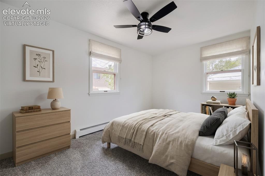 Image 16 of 41: Light-colored wall-to-wall carpeting. Virtually staged.