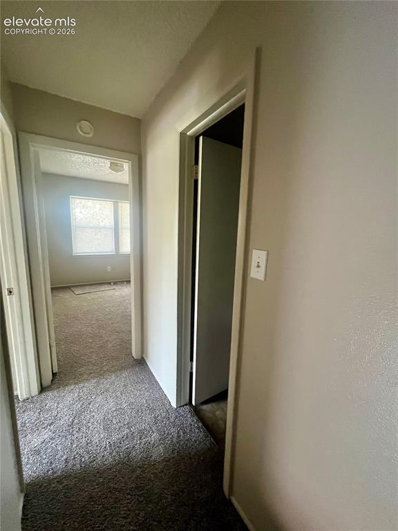 Image 15 of 27: leading to upstairs bedrooms