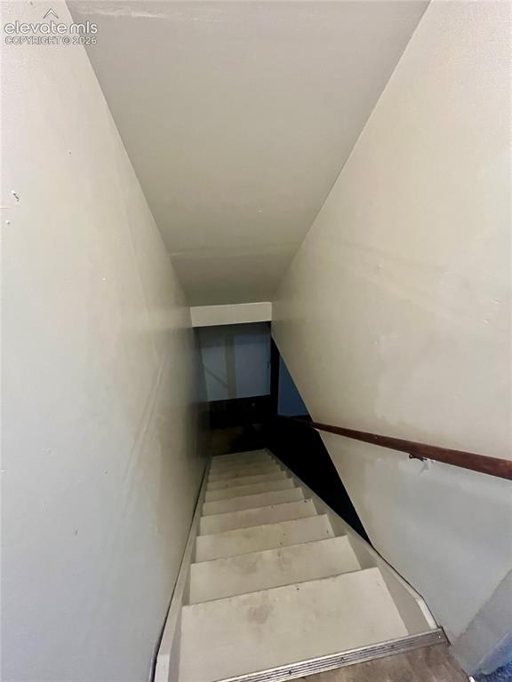 Image 22 of 27: leading to unfinished basement