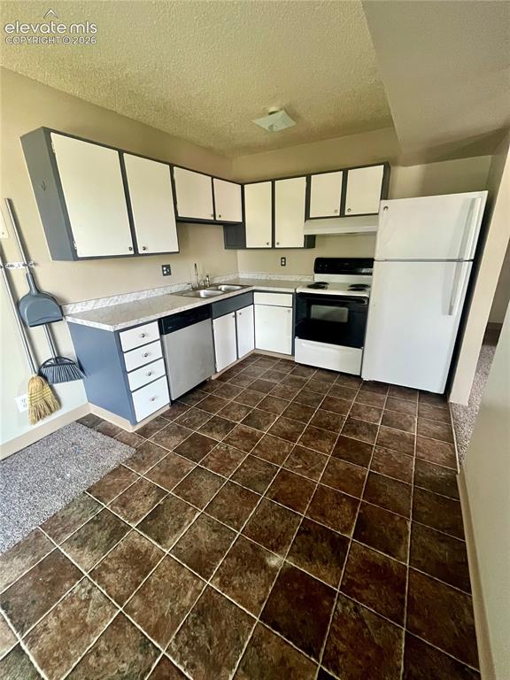 Image 3 of 27: new vinyl floors and new kitchen counter & sink