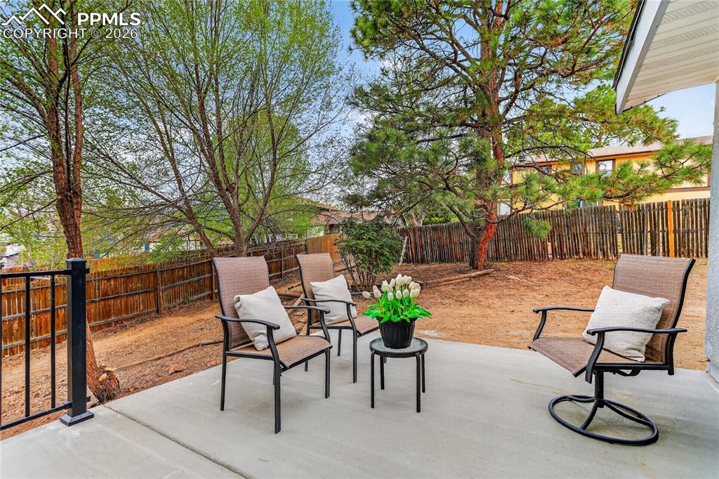 Image 22 of 24: New back patio for outdoor entertainment