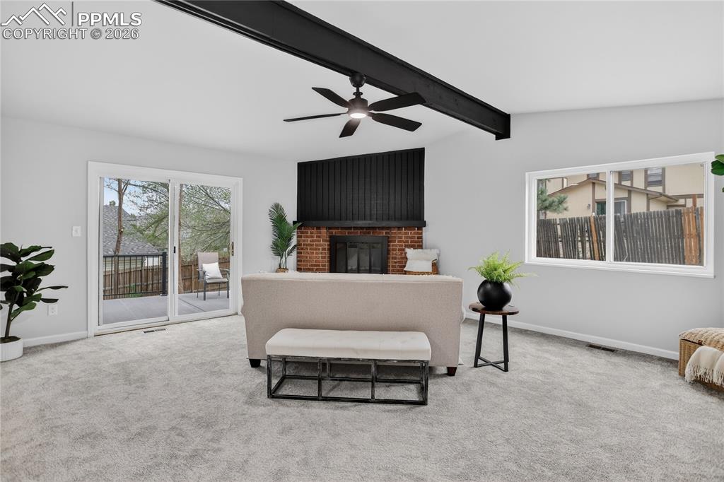 Image 9 of 24: Open family room w/ walk-out