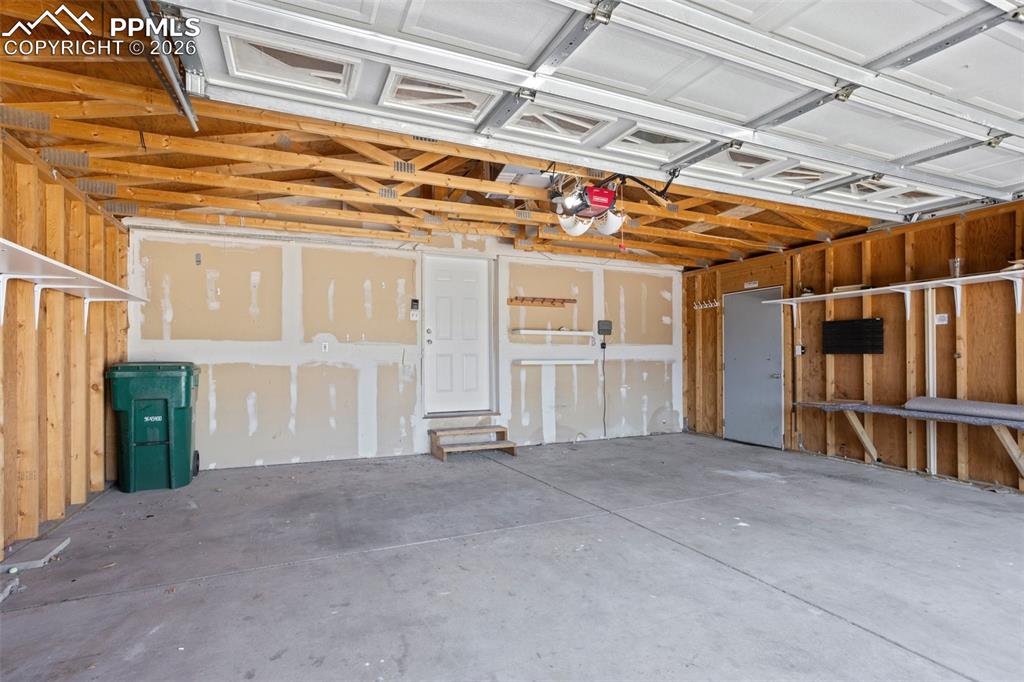 Image 33 of 37: The home has its own attached 2-car garage!