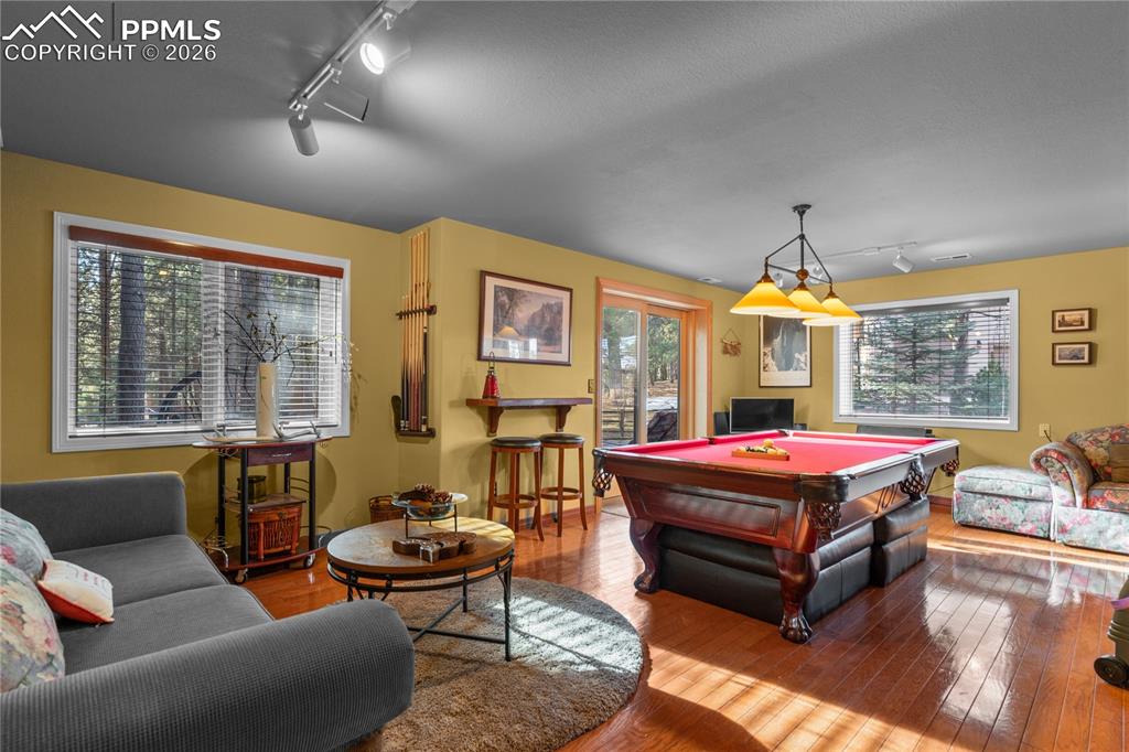 Image 31 of 38: The basement is the perfect place for an additional living space, gym, game