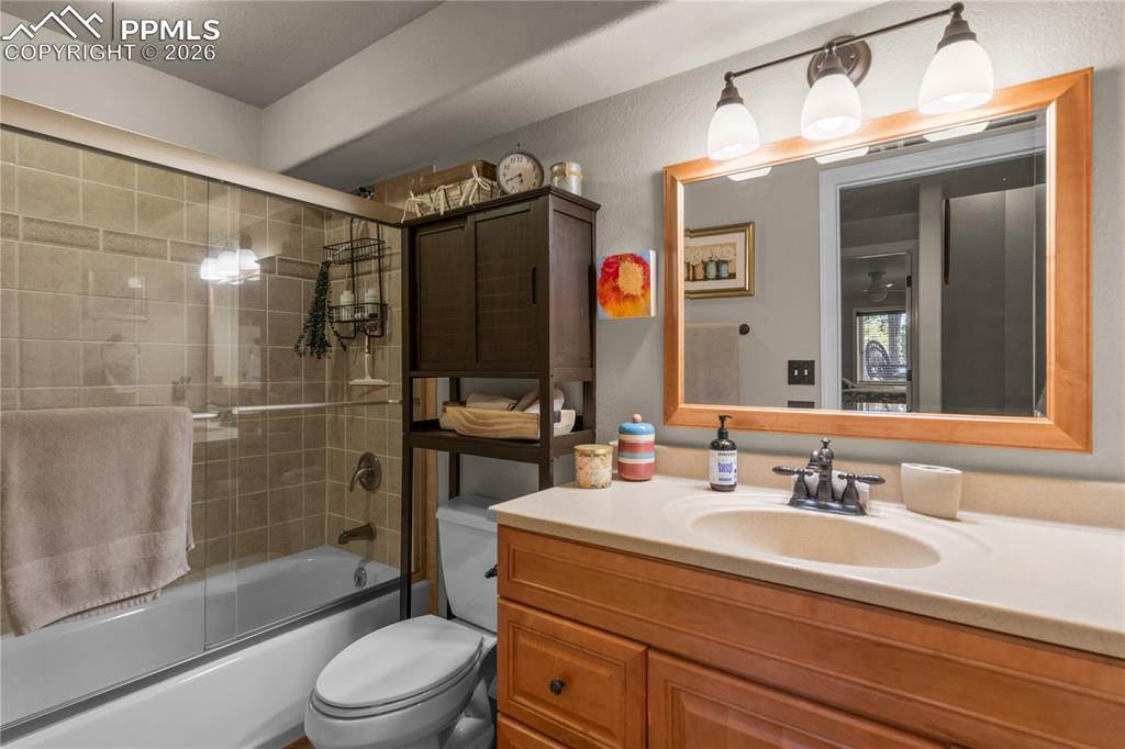 Image 33 of 38: The basement has a full bathroom with 2 bedrooms.