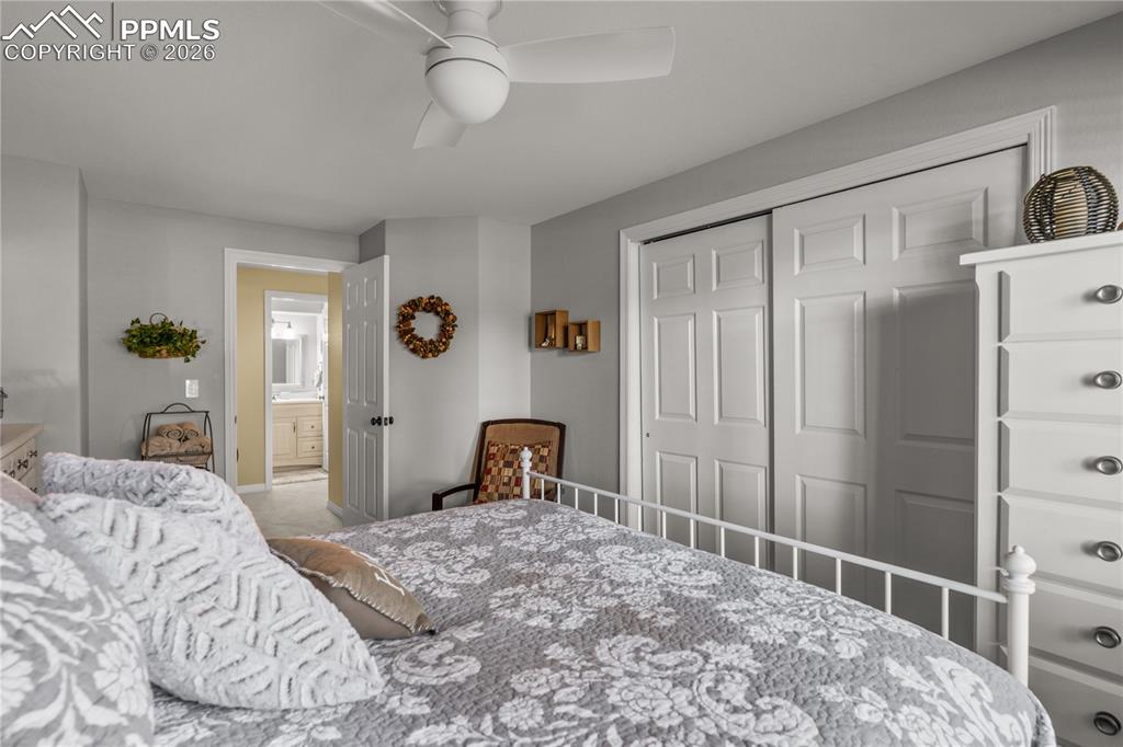Image 34 of 38: The basement bedrooms are bright and have ceiling fans - it doesn