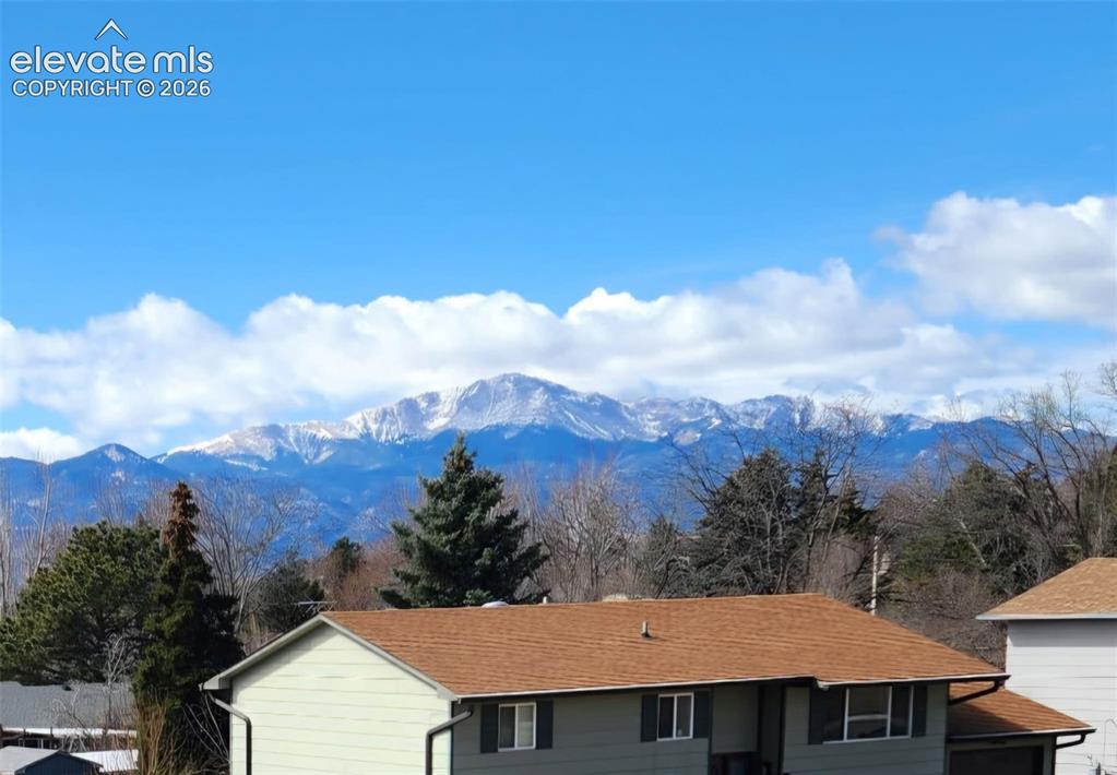 Image 3 of 32: View of Pikes Peak from upper level
