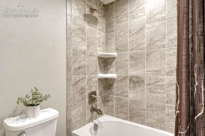 Image 32 of 50: Lower level-full bath