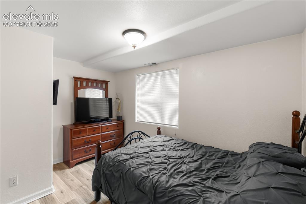 Image 21 of 34: Fifth bedroom in basement