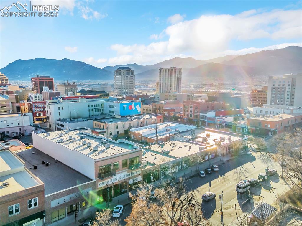 Image 46 of 48: City view featuring mountains