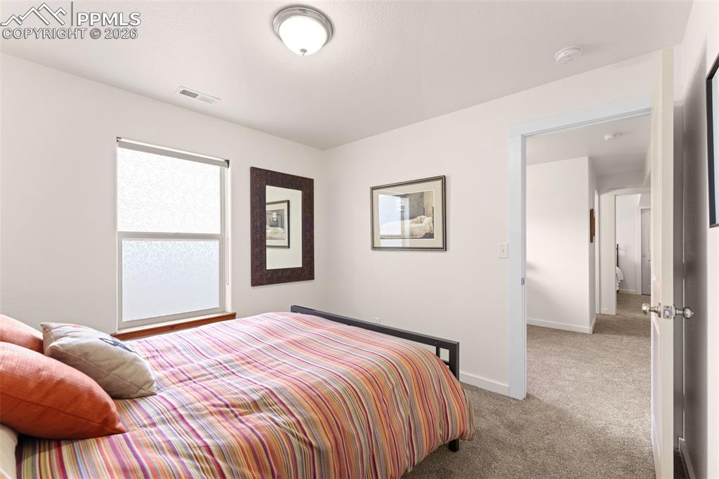 Image 25 of 38: Guest Bedroom