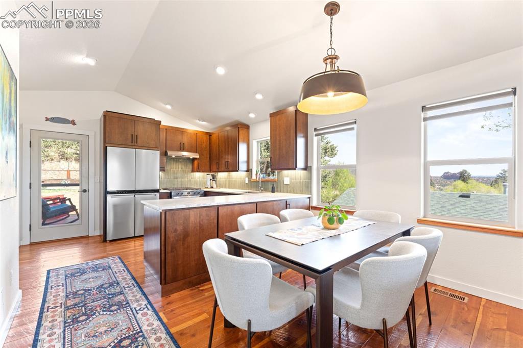 Image 7 of 38: Dining Room to Kitchen View