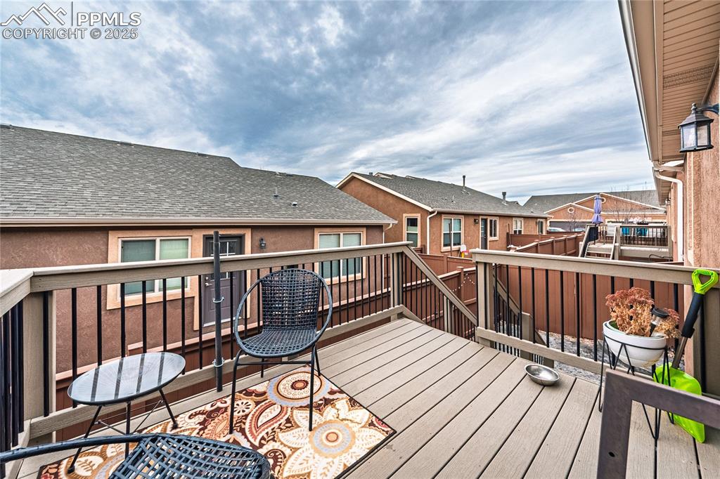 Image 31 of 36: Deck with a residential view