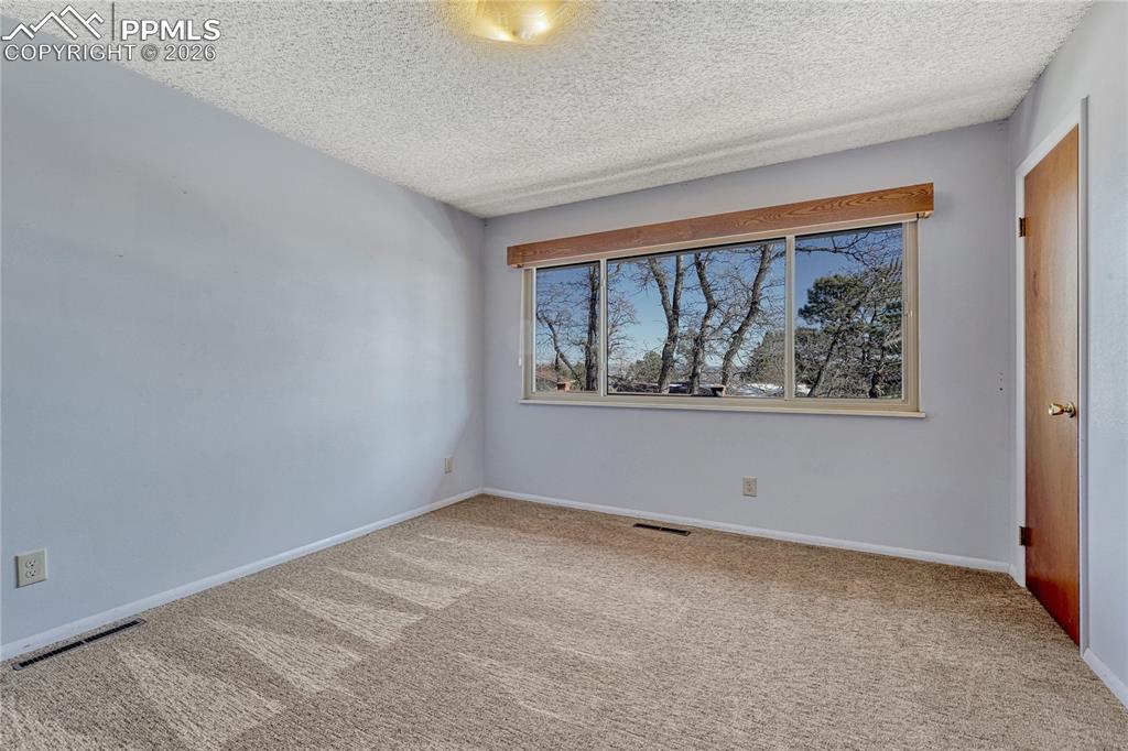 Image 19 of 49: Bedroom