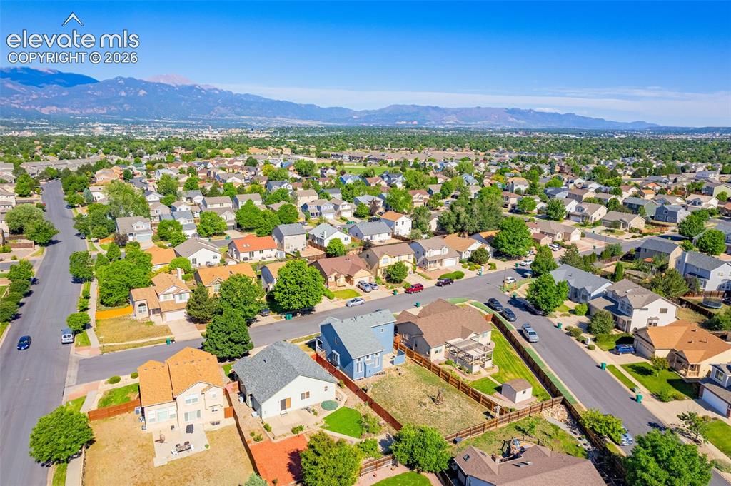 Image 36 of 42: Expansive residential neighborhood featuring numerous single-family homes w