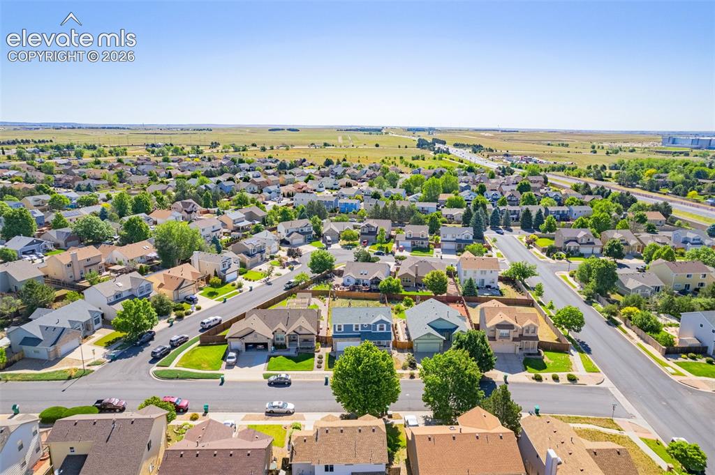 Image 37 of 42: Aerial perspective showcasing a residential area with varied home styles an