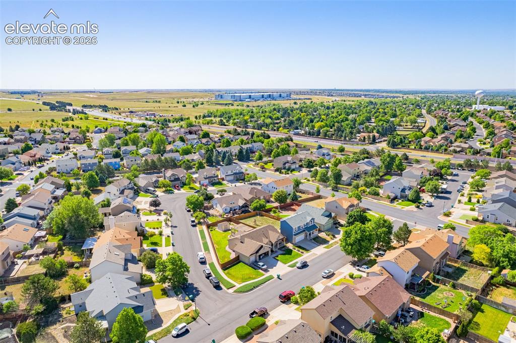Image 38 of 42: Expansive neighborhood featuring numerous detached homes with varied archit