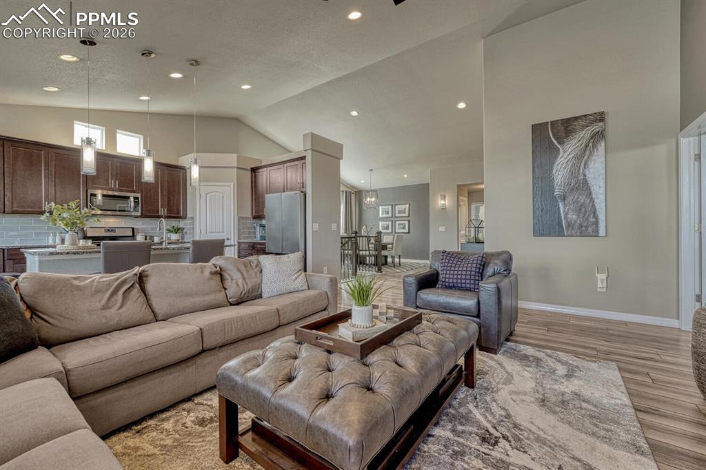 Image 17 of 50: View of the Living Room, Kitchen, and Dining Room.