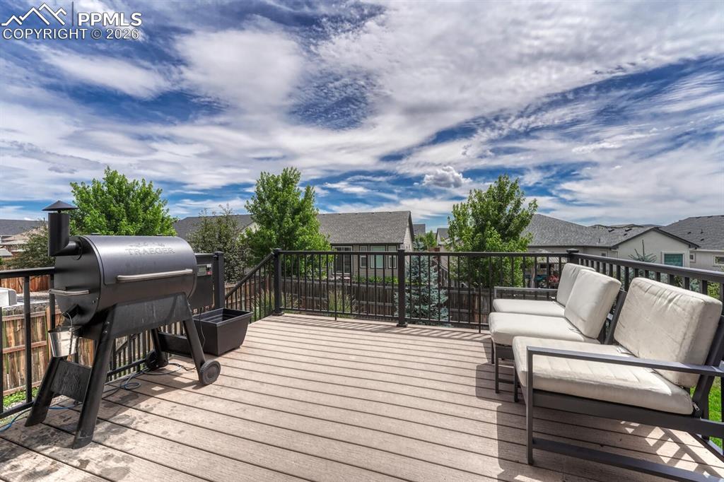 Image 22 of 50: Enjoy BBQs and outdoor fun on the backyard composite deck.
