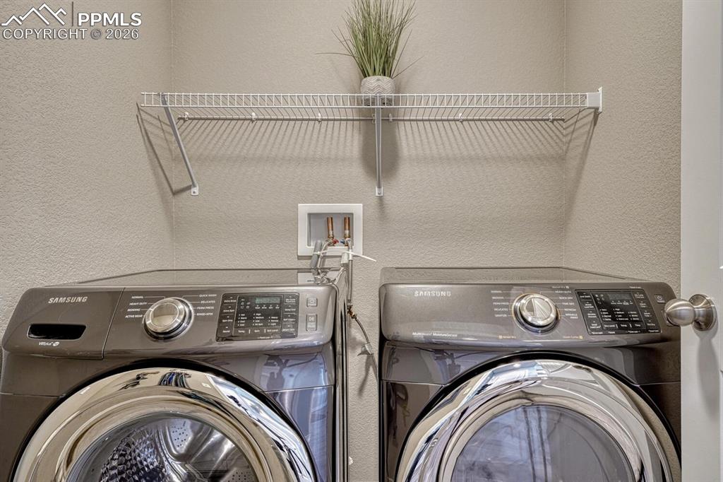 Image 30 of 50: The Laundry Room is conveniently located on the main floor and washer/dryer