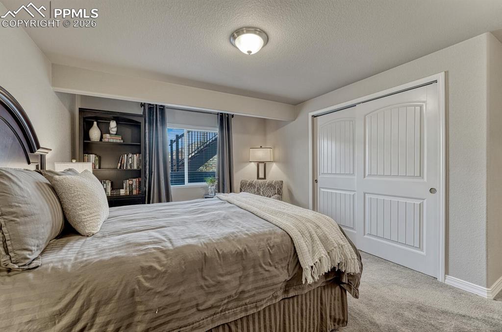 Image 41 of 50:  Basement Bedroom #3 has a generous closet.