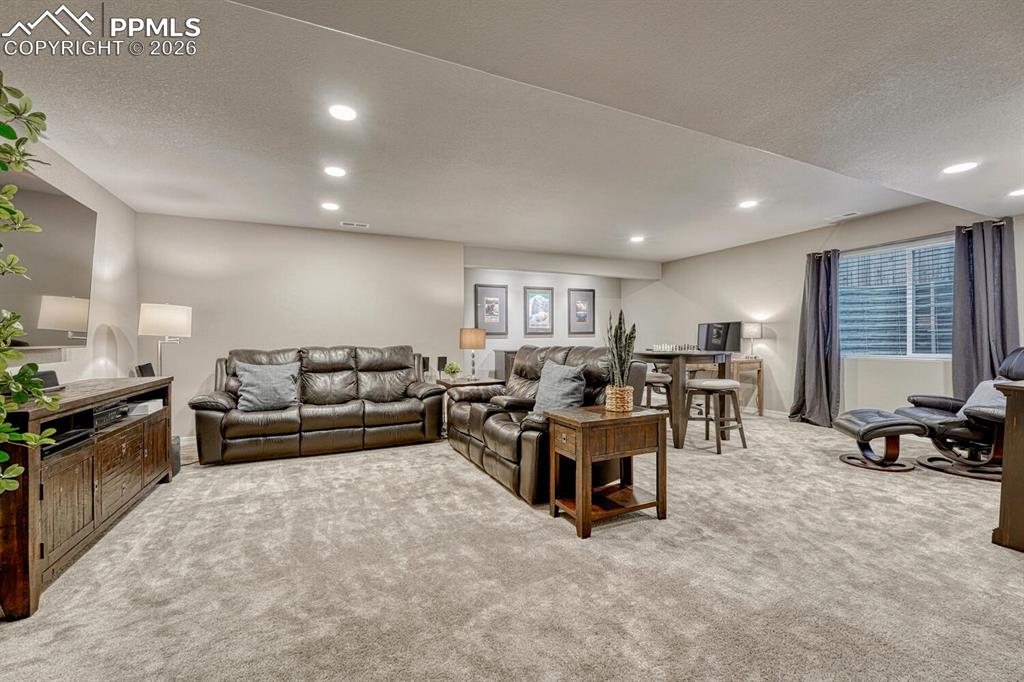 Image 6 of 50: The huge Basement Recreation Room expands your living space for things like