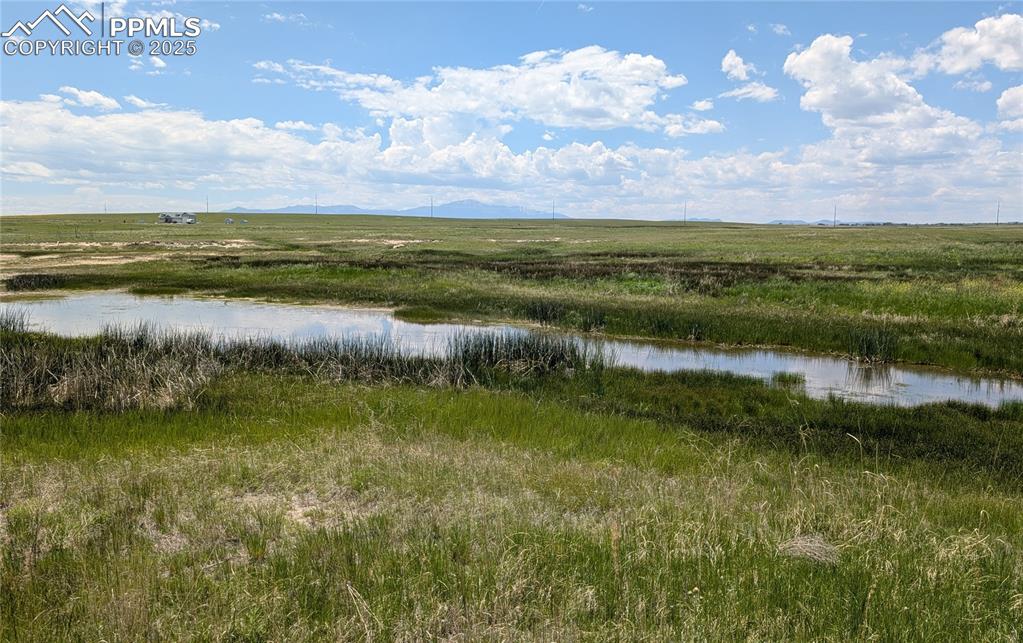 Image 6 of 24: Walking your own property offers Pikes Peak views from the vast majority of