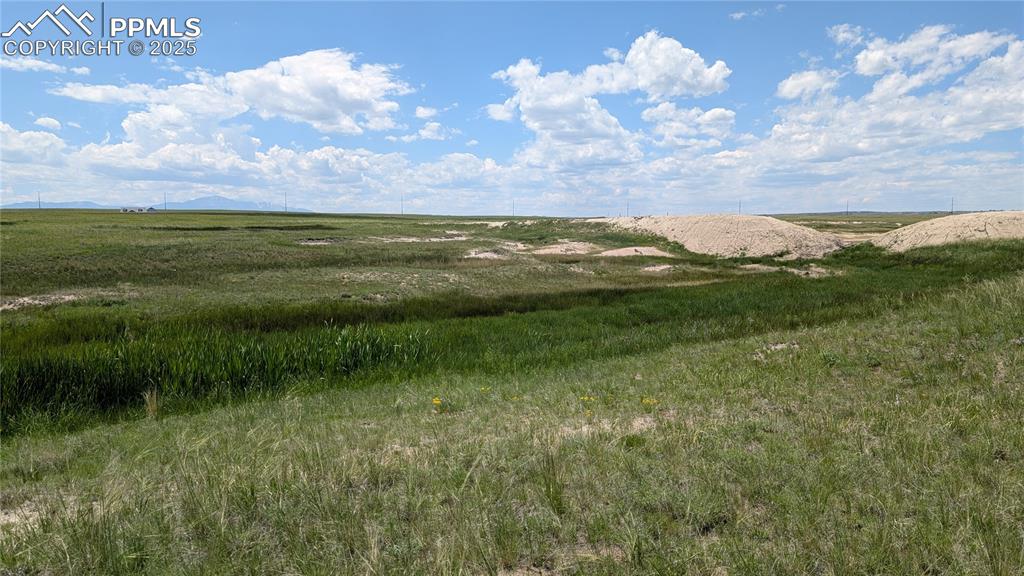 Image 8 of 24: With the right permissions, this old earthen dam could possibly be restored