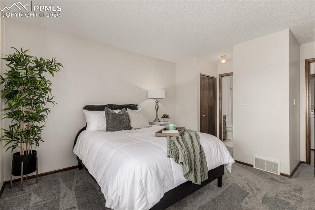 Image 17 of 25: Main level with dual closets