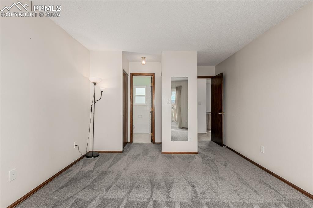 Image 21 of 25: Upper level with dual closets