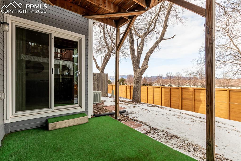 Image 24 of 25: Walkout Covered Patio 