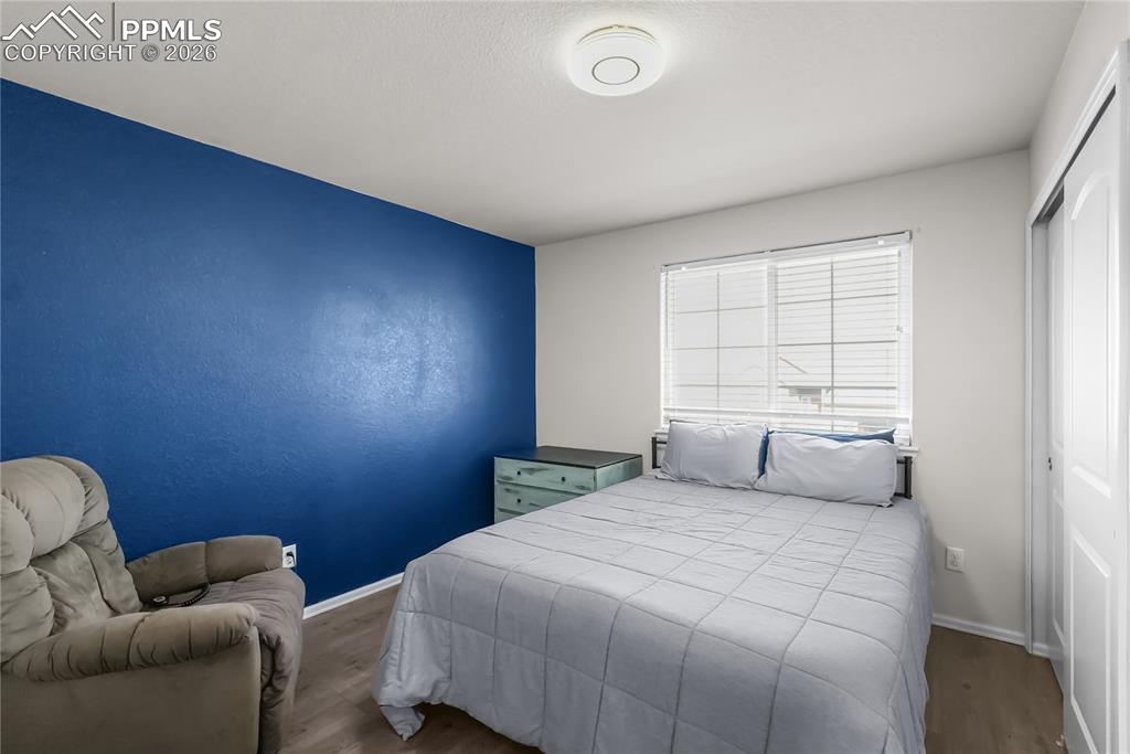 Image 15 of 25: Second bedroom.