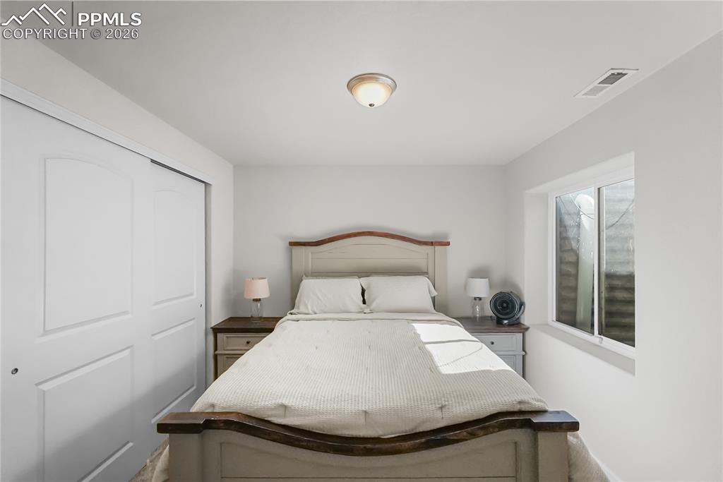 Image 19 of 25: Basement fourth bedroom.