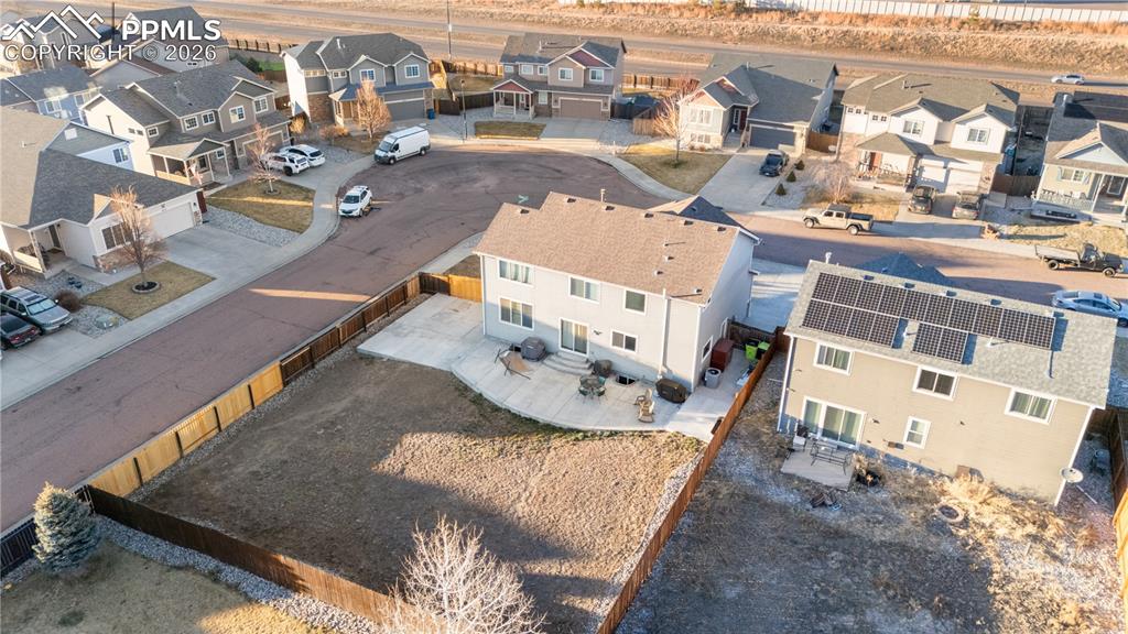 Image 21 of 25: Massive concrete patio for summer BBQ
