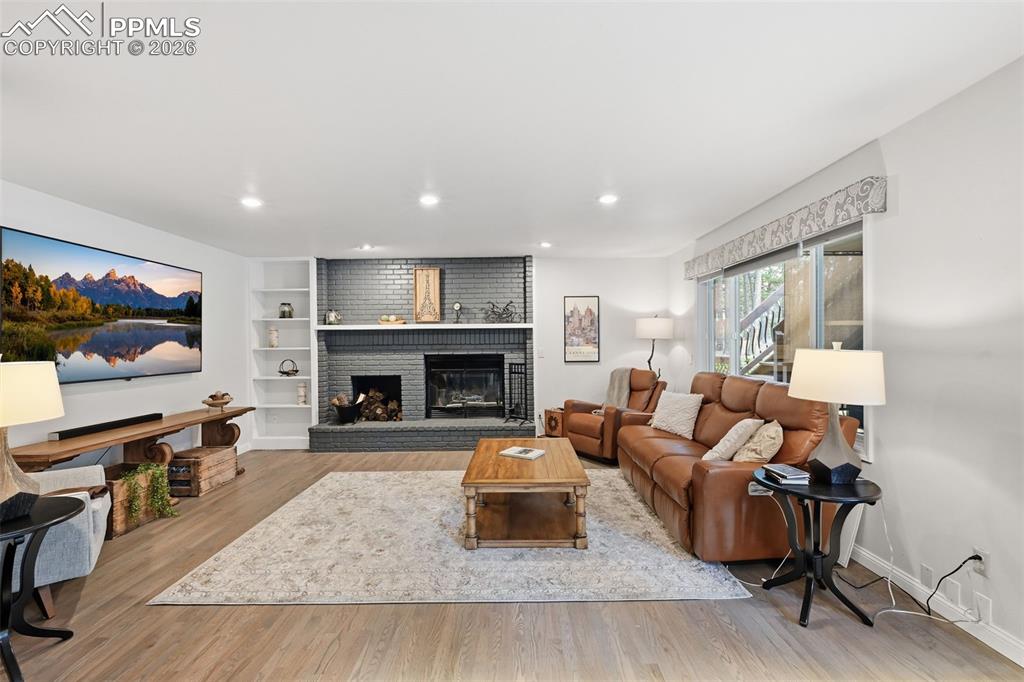 Image 14 of 50: Living room with fireplace