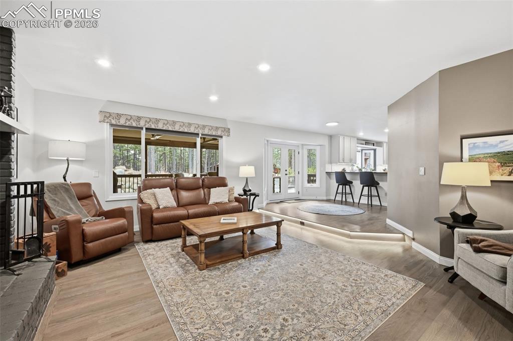 Image 15 of 50: Living room with fireplace