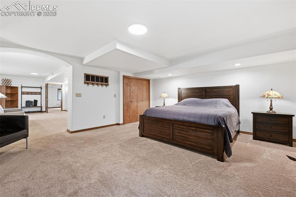 Image 29 of 50: Bedroom suite in basement