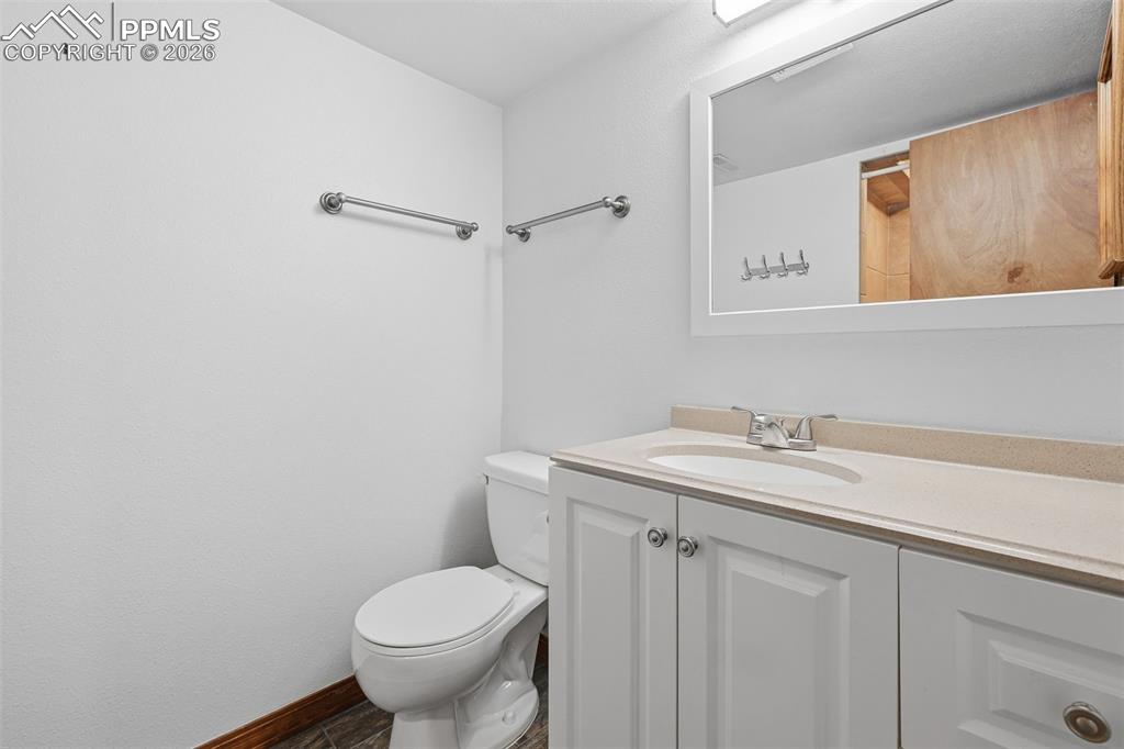 Image 30 of 50: Bathroom in basement