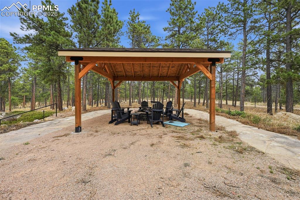 Image 38 of 50: Pavilion with gas fire pit