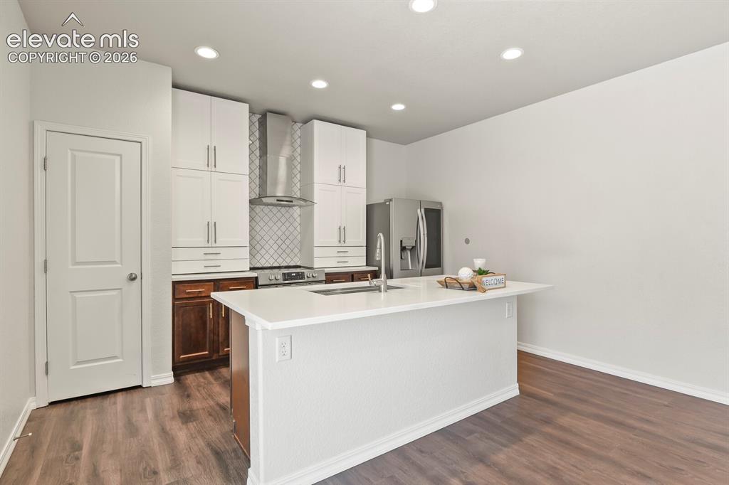 Image 11 of 29: The upgraded kitchen tile is stunning