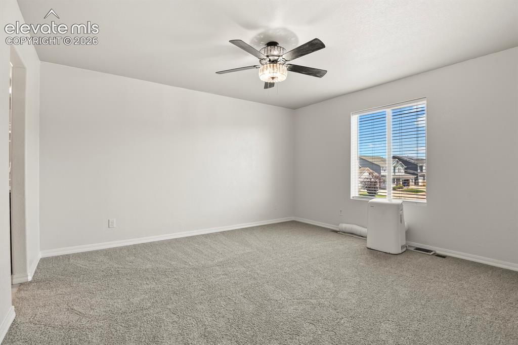 Image 16 of 29: The, in window, air conditioner comes with the house for your sleeping comf