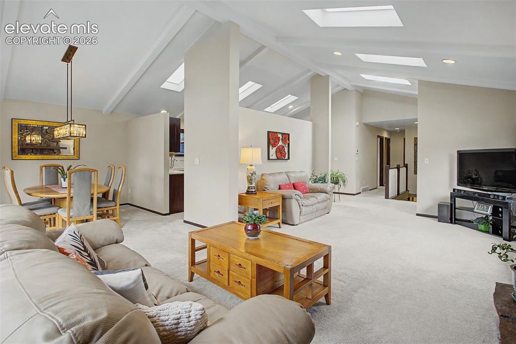 Image 12 of 49: 2 separate living areas on main floor