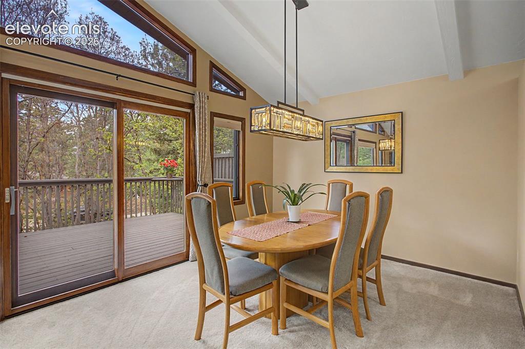 Image 17 of 49: Walkout to 25 x 12 Deck to expand living area.