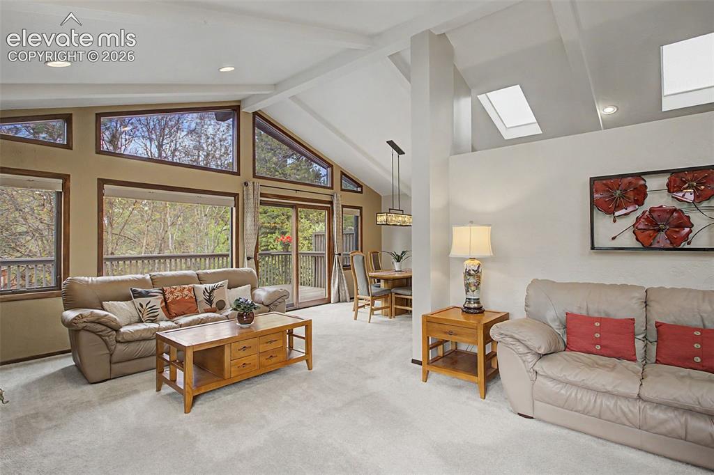 Image 2 of 49: Vaulted Beamed Ceilings with Pella Windows