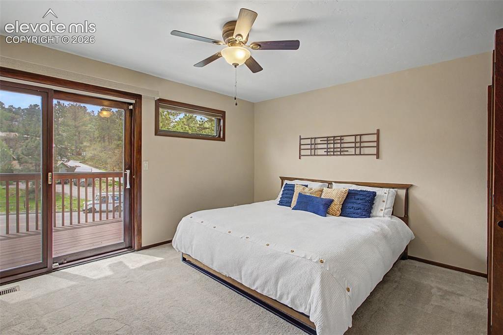 Image 20 of 49: Private 23 x 8 Deck off Primary Bedroom.